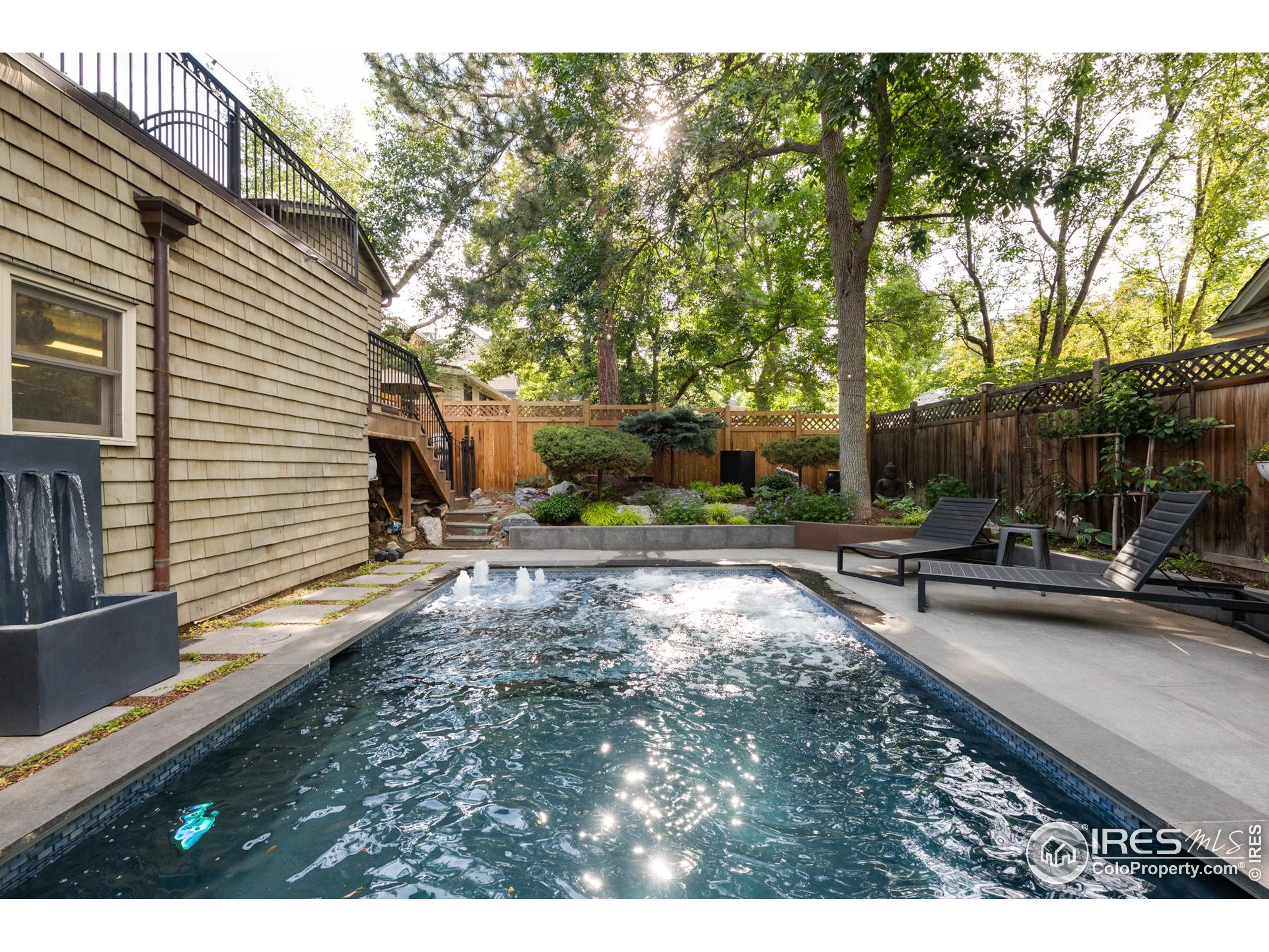 643 Mapleton Avenue Boulder, CO 80304 - Photo 35 of 50 a view of a house with backyard and sitting area