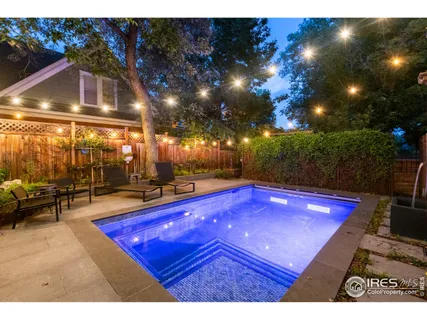 a kitchen with wooden cabinets and a stove top oven