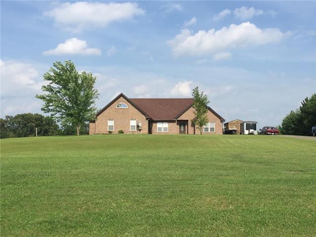 4755 South Qualls Road Adams, TN 37010 - Photo 1 of 20 Front View of this all brick home on 5.68 acres.