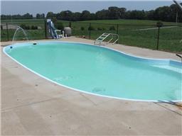 4755 South Qualls Road Adams, TN 37010 - Photo 11 of 20 Gorgeous in-ground pool completely fenced in and ready for you! Pool comes with all equipment including handicapped lift.