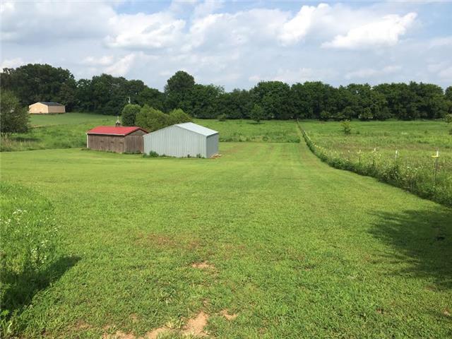 4755 South Qualls Road Adams, TN 37010 - Photo 13 of 20 Lots of pasture for horses. Back yard is completely fenced in for horses or pets.
