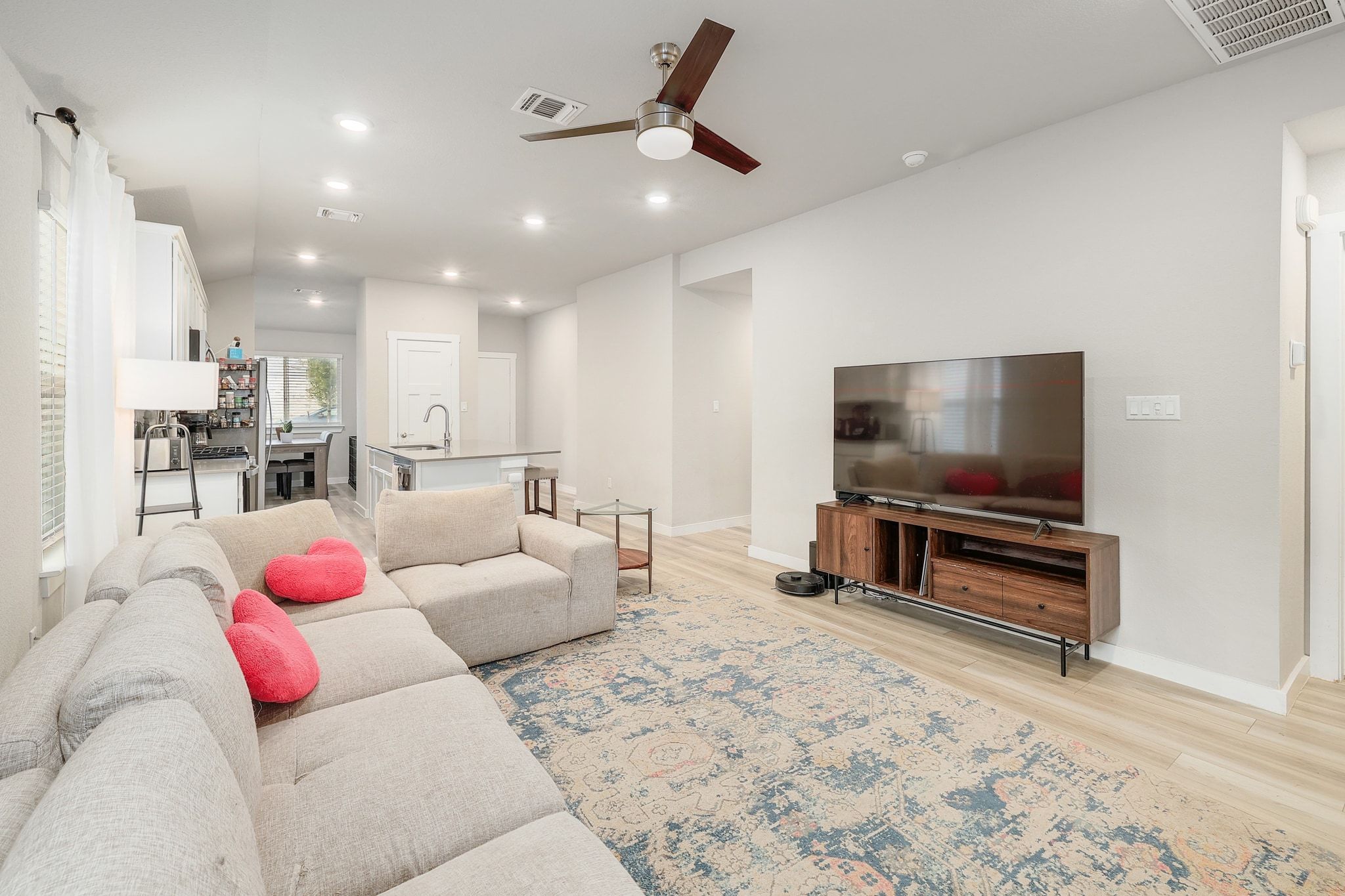 204 Halford Road Georgetown, TX 78633 - Photo 6 of 27 Living area featuring ceiling fan, light wood-style flooring, lofted ceiling, and recessed lighting