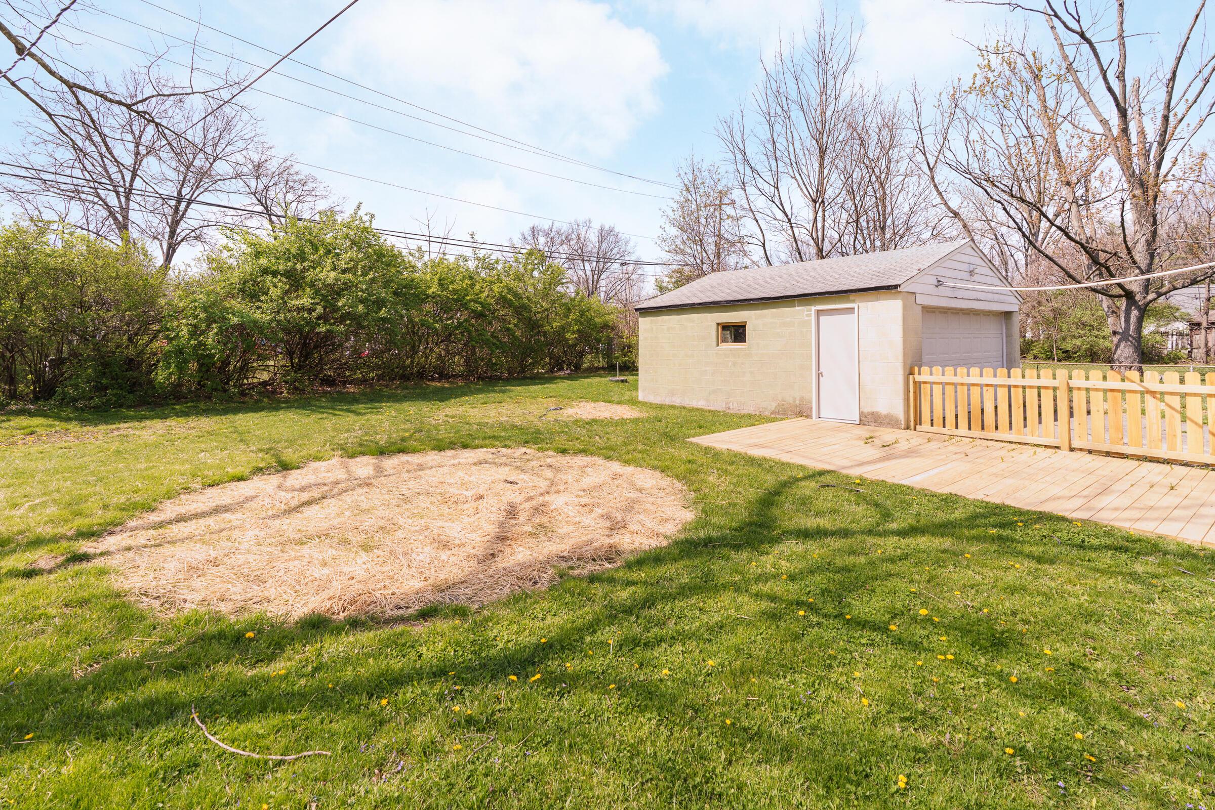 805 Exeter Road Whitehall, OH 43213 - Photo 26 of 28 Fenced backyard with deck