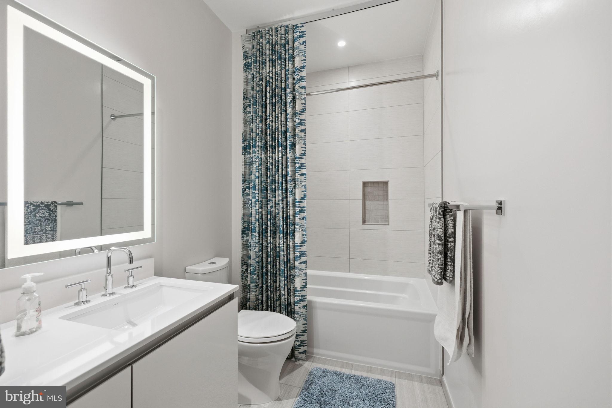 1745 N Street Northwest, Unit 113 Washington, DC 20036 - Photo 17 of 17 a bathroom with a sink toilet and shower