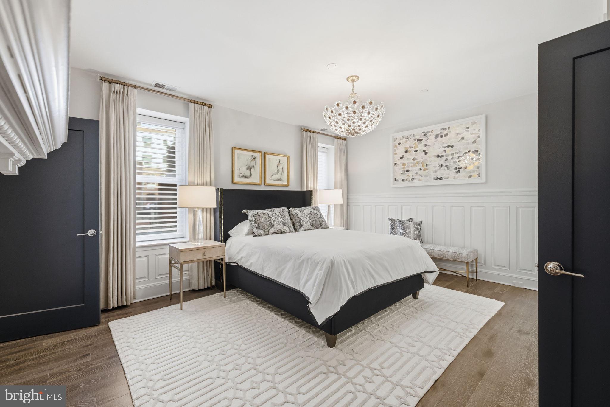 1745 N Street Northwest, Unit 113 Washington, DC 20036 - Photo 5 of 17 a bedroom with a bed and a window