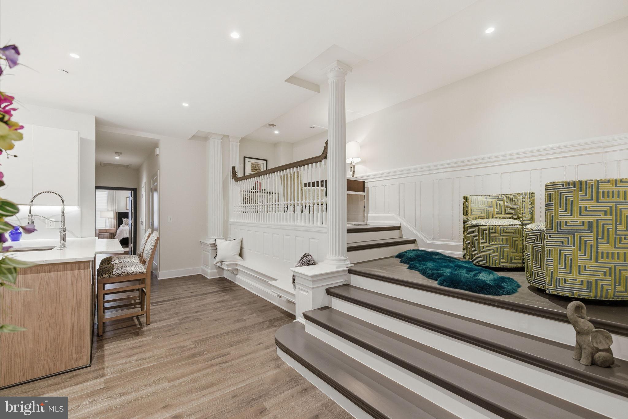 1745 N Street Northwest, Unit 113 Washington, DC 20036 - Photo 10 of 17 a view of entryway with workspace and wooden floor