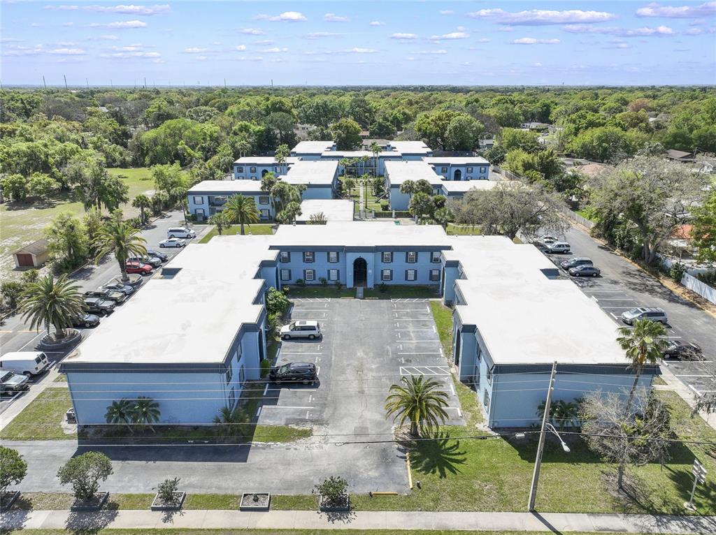5200 Curry Ford Road, Unit 102 Orlando, FL 32812 - Photo 14 of 23 an aerial view of a house with a yard