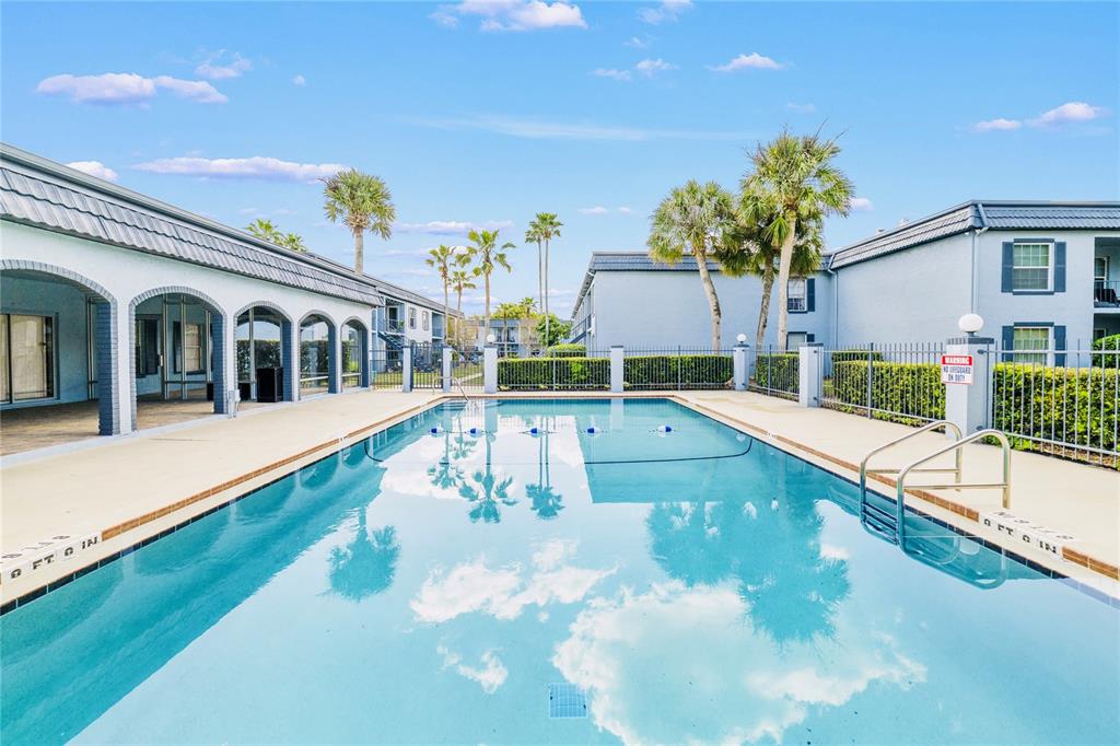 5200 Curry Ford Road, Unit 102 Orlando, FL 32812 - Photo 16 of 23 a view of a house with swimming pool