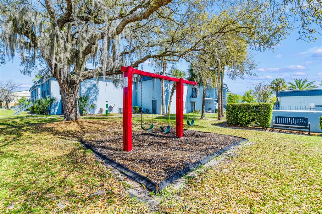 5200 Curry Ford Road, Unit 102 Orlando, FL 32812 - Photo 18 of 23 a small garden in the corner of a house