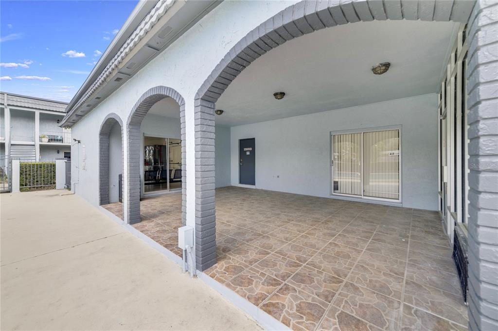 5200 Curry Ford Road, Unit 102 Orlando, FL 32812 - Photo 19 of 23 a view of a livingroom with a staircase
