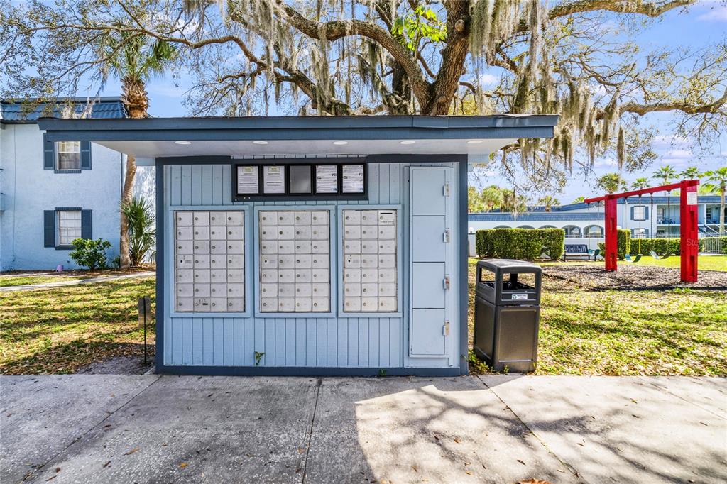 5200 Curry Ford Road, Unit 102 Orlando, FL 32812 - Photo 22 of 23 front view of a house with a yard