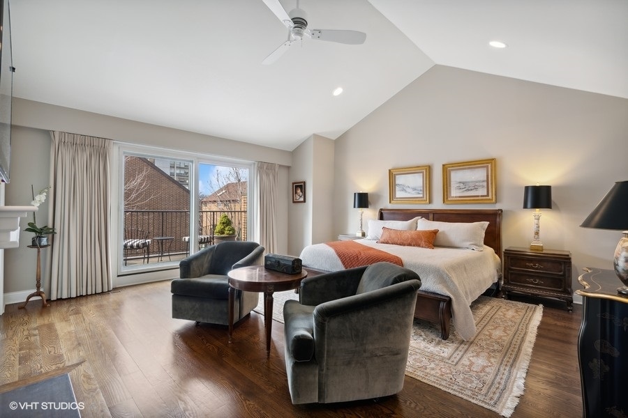 1335 North Sutton Place Chicago, IL 60610 - Photo 11 of 31 a living room with furniture and a large window