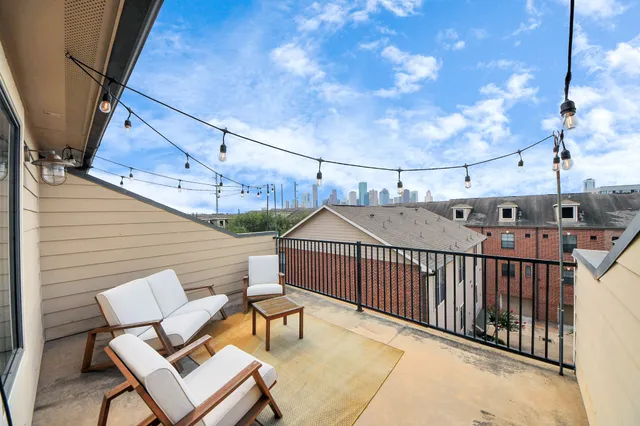 a view of a chairs in wooden deck