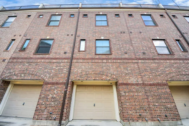a view of a building with a bench in front of it