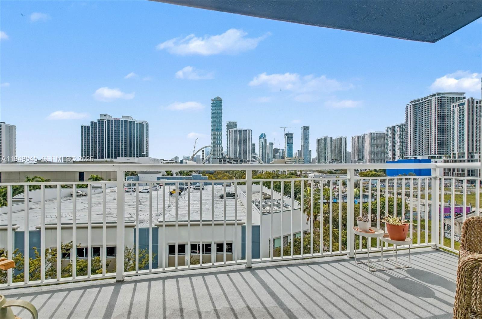275 Northeast 18th Street, Unit 703 Miami, FL 33132 - Photo 12 of 28 a view of balcony with furniture