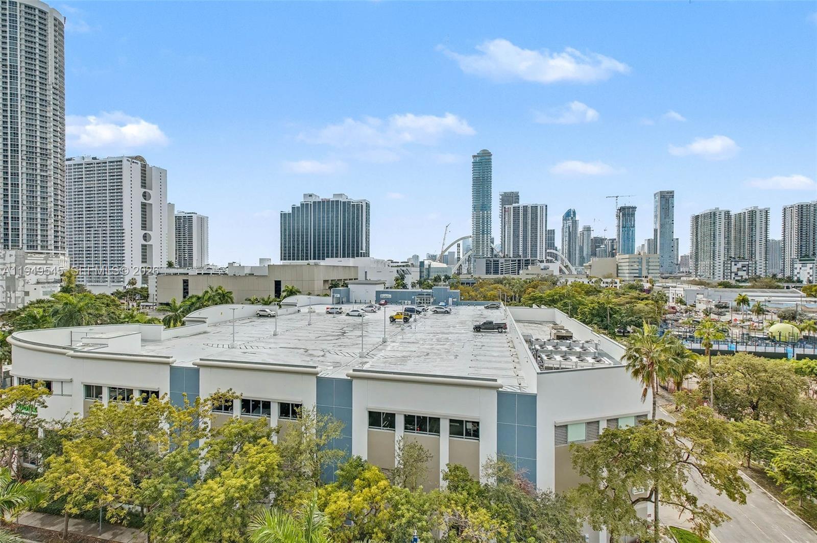 275 Northeast 18th Street, Unit 703 Miami, FL 33132 - Photo 21 of 28 a view of a city with tall buildings