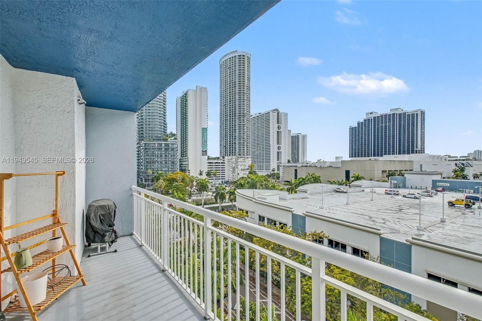 275 Northeast 18th Street, Unit 703 Miami, FL 33132 - Photo 22 of 28 a view of balcony with furniture and city view