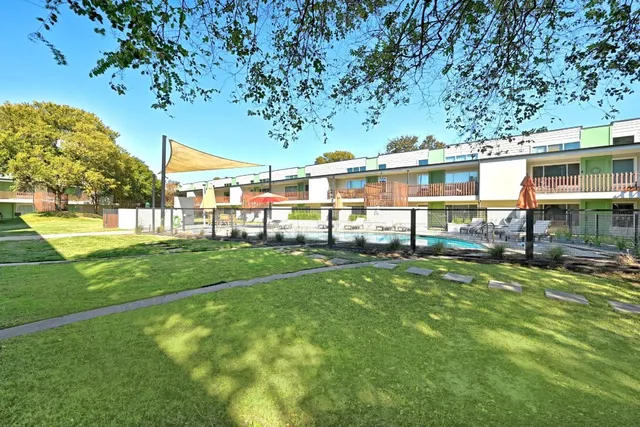 a view of a house with a big yard