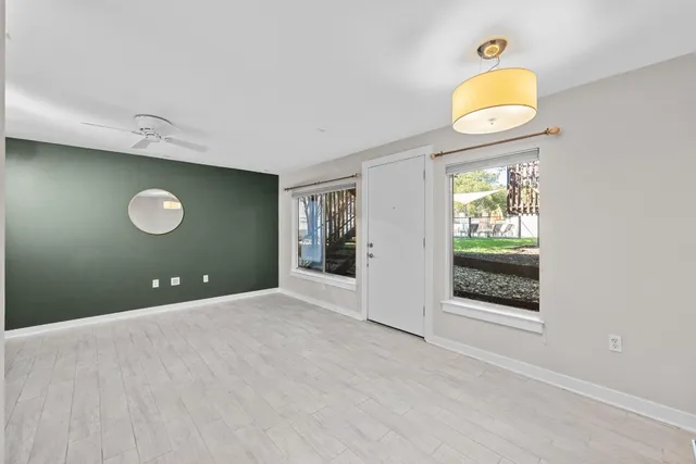 a view of an empty room and window