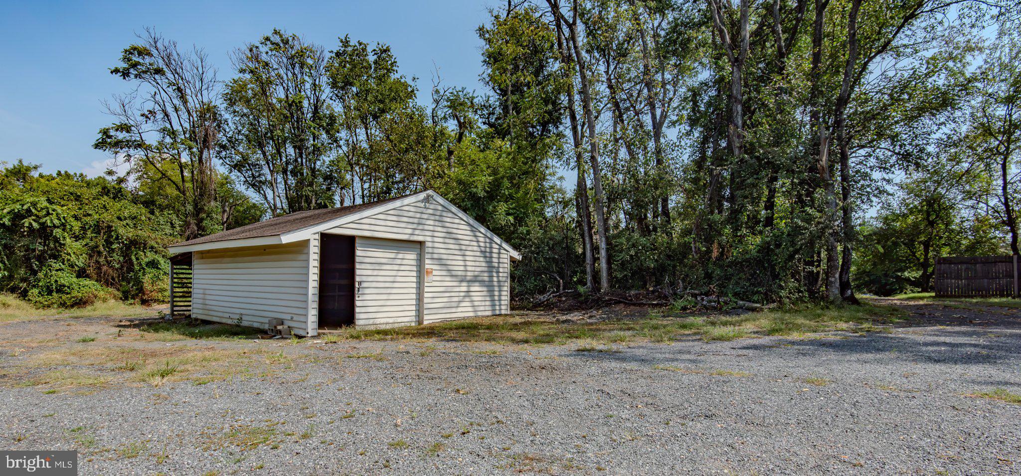 4308 High Ridge Road Haymarket, VA 20169 - Photo 84 of 94 Large garage with storage and parking lot