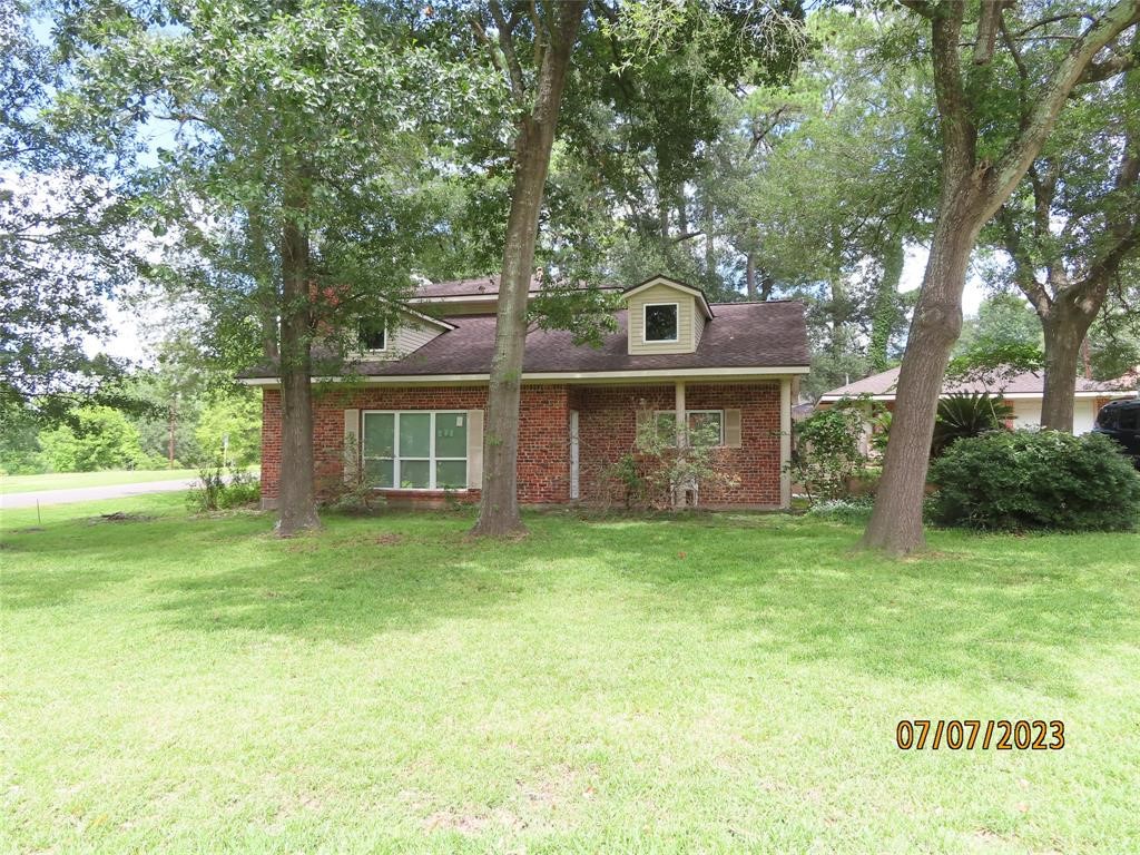 403 High Ridge Street Houston, TX 77013 - Photo 13 of 13 a front view of a house with a garden