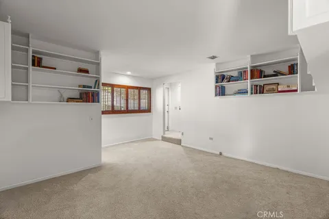 a large bathroom with a sink a large mirror and a shower