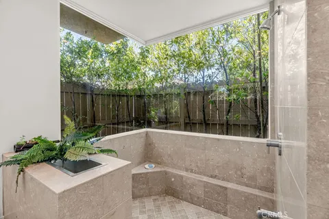 a view of balcony with wooden floor and outdoor space
