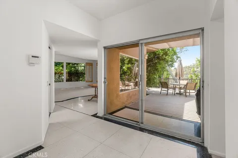 a kitchen with stainless steel appliances granite countertop a sink and stove top oven