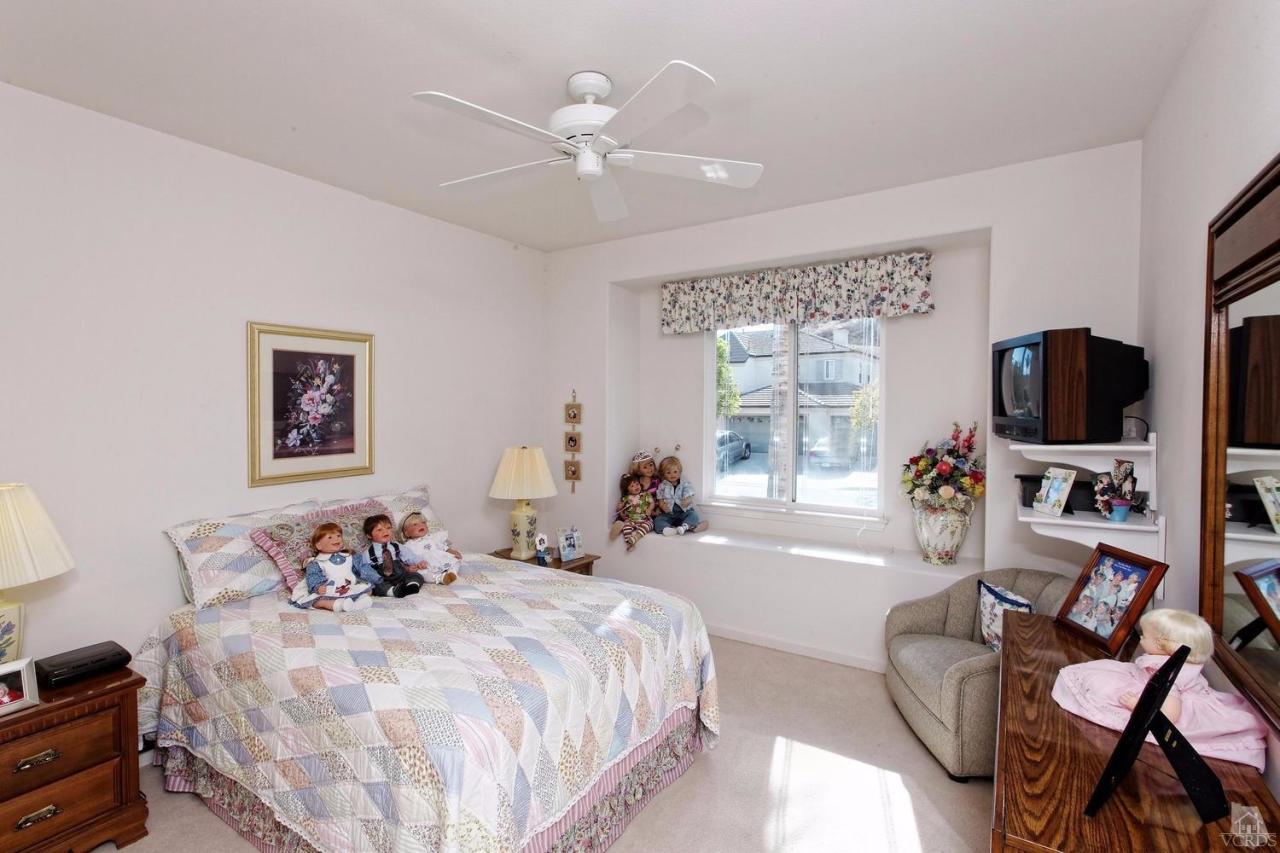 3248 Bluebird Circle Simi Valley, CA 93063 - Photo 13 of 28 a bedroom with a bed and a flat screen tv