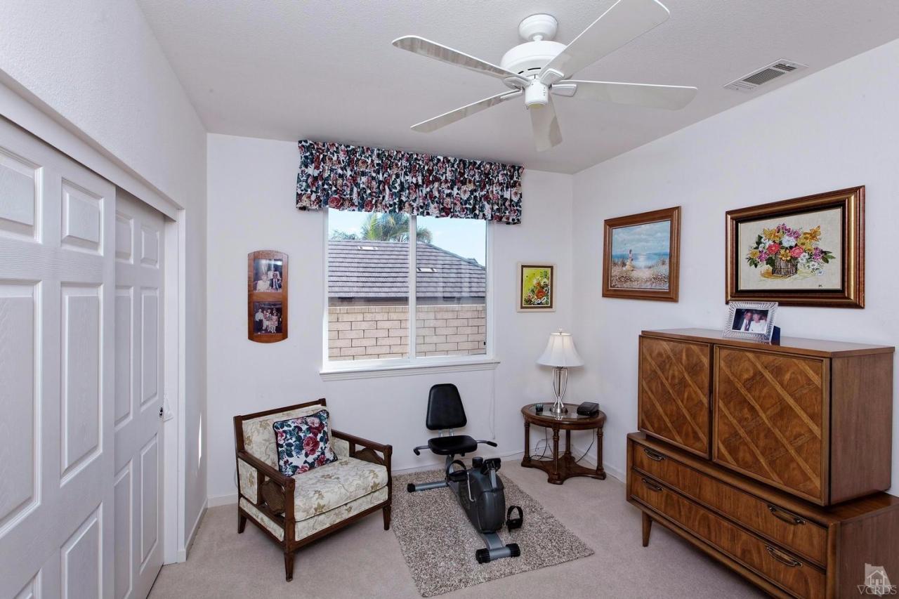 3248 Bluebird Circle Simi Valley, CA 93063 - Photo 15 of 28 a living room with furniture a couch and a window