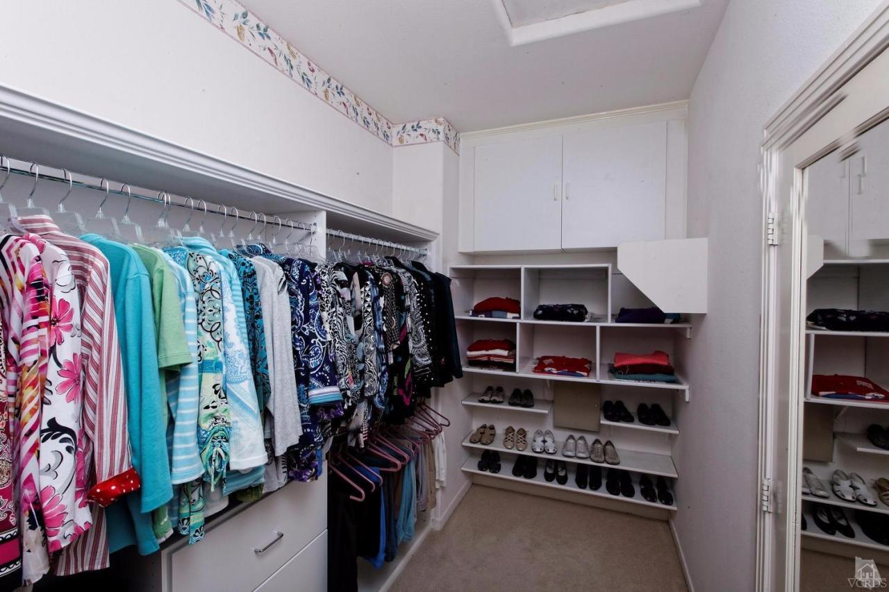 3248 Bluebird Circle Simi Valley, CA 93063 - Photo 20 of 28 a view of walk in closet with clothes and shoes