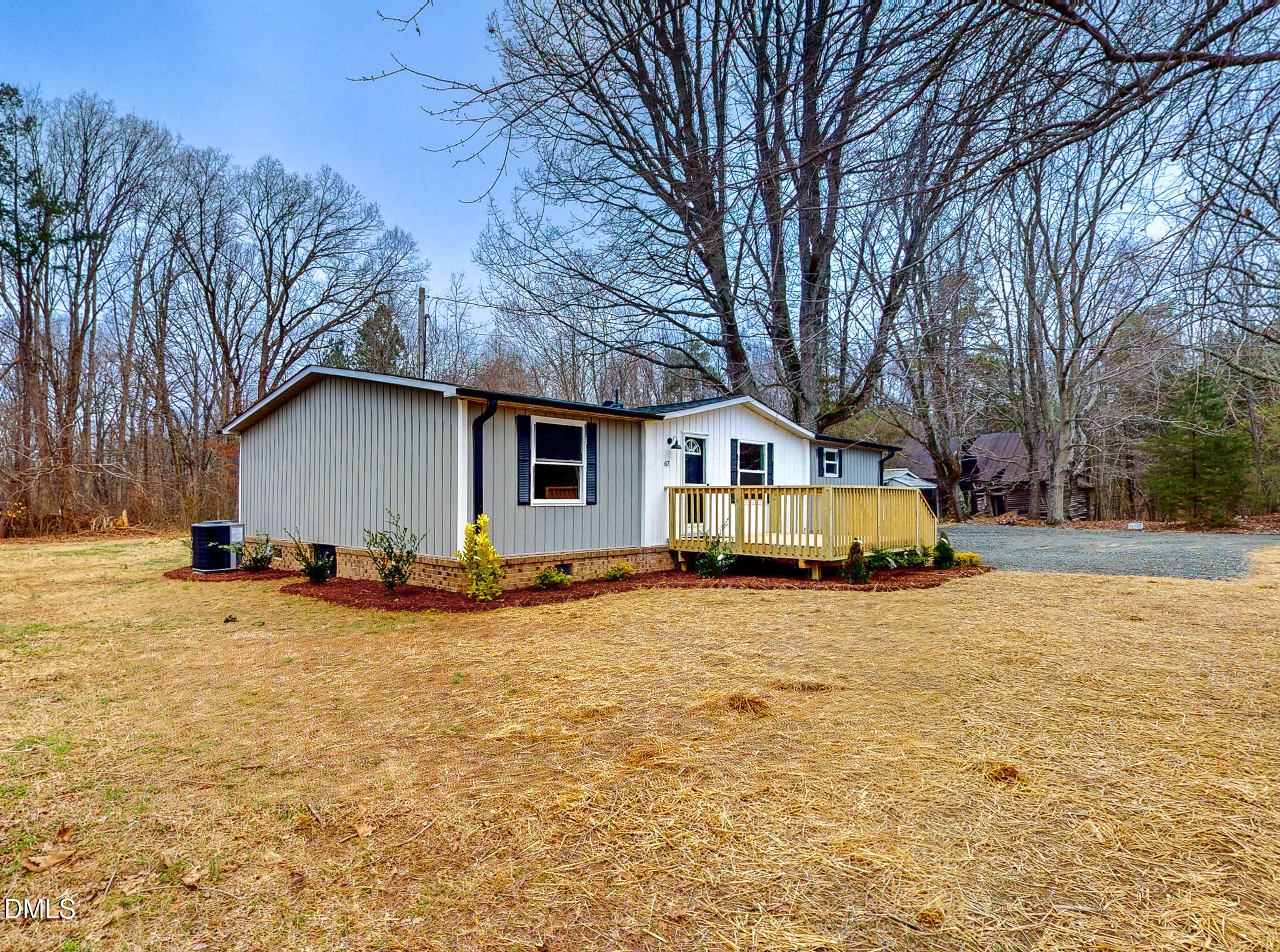 67 Halifax Road Roxboro, NC 27574 - Photo 26 of 48 a view of house with yard covered with snow