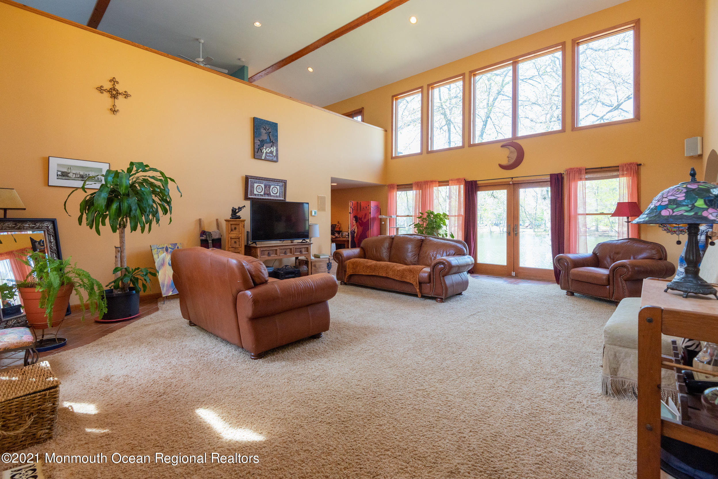 209 Pond Road Freehold, NJ 07728 - Photo 8 of 44 a living room with furniture and a large window