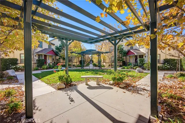 a view of swimming pool with a patio