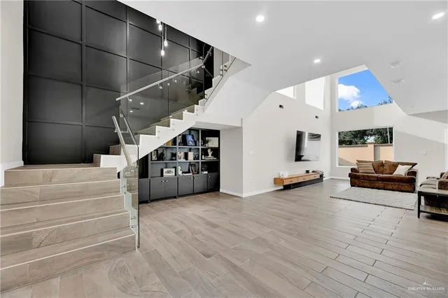 a living room with furniture and lots of furniture
