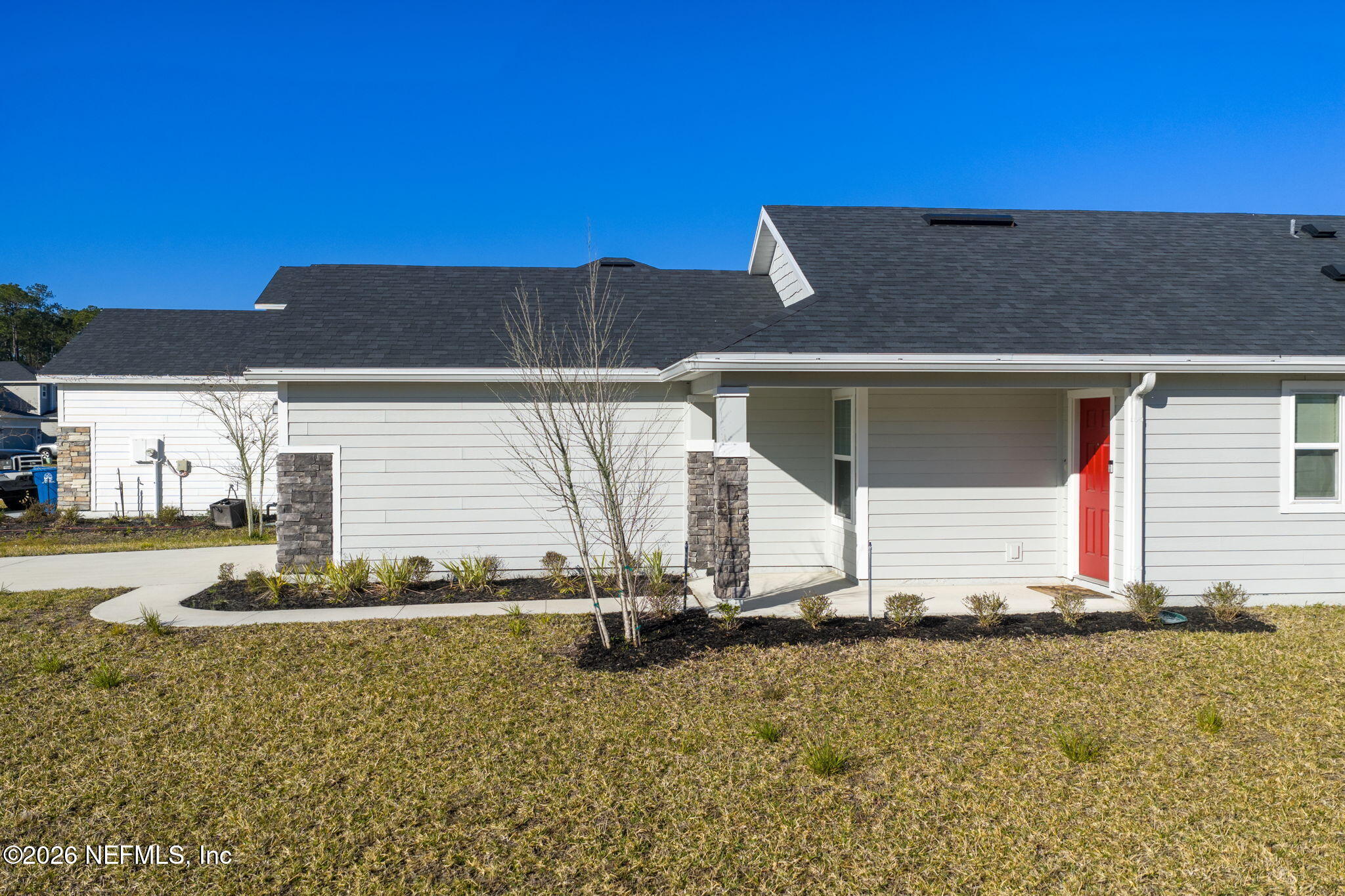 277 Rambling Brk Trail St. Johns, FL 32259 - Photo 3 of 51 a front view of a house with a yard