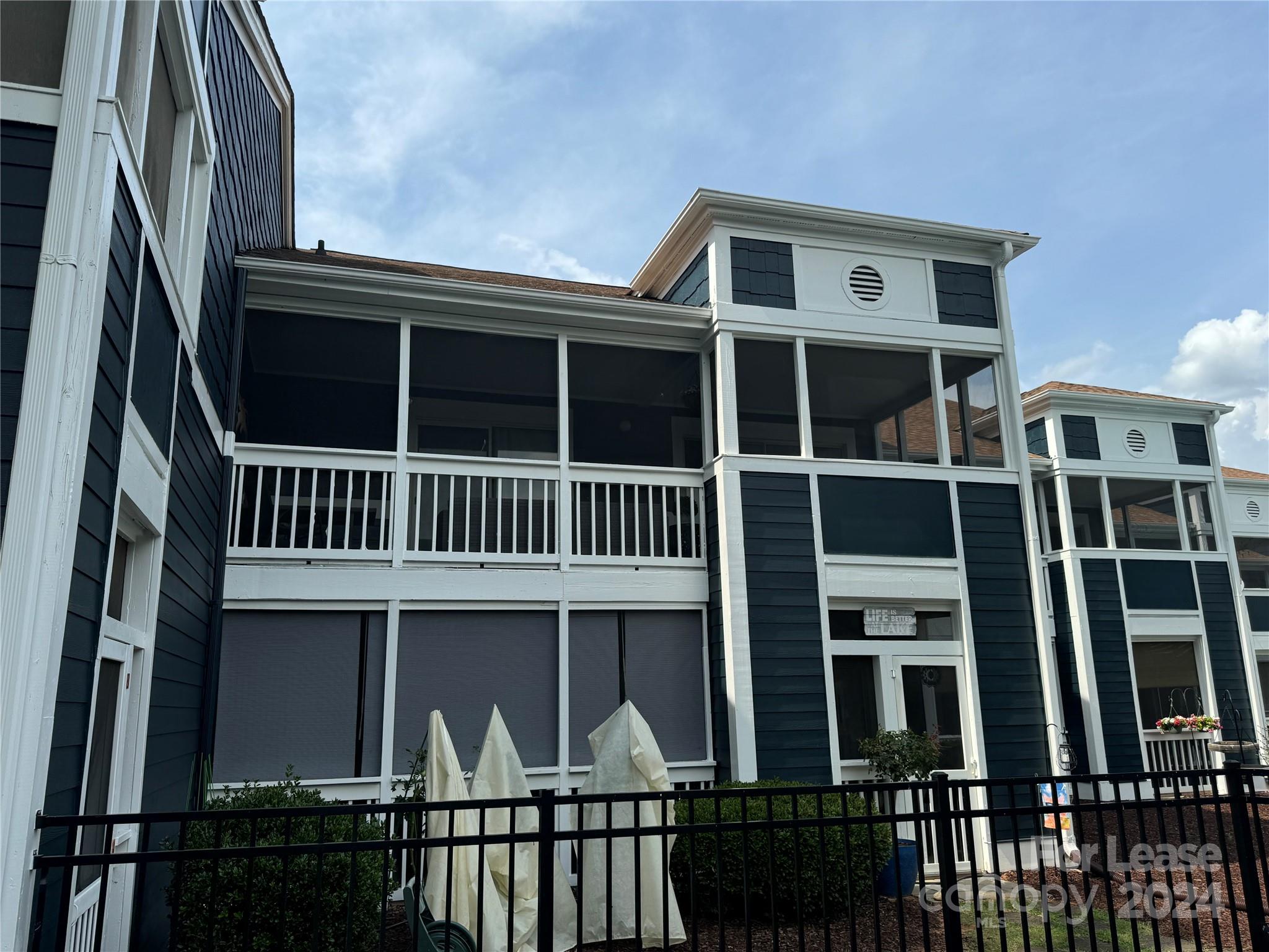 17542 Tuscany Lane Cornelius, NC 28031 - Photo 33 of 35 a view of a large building