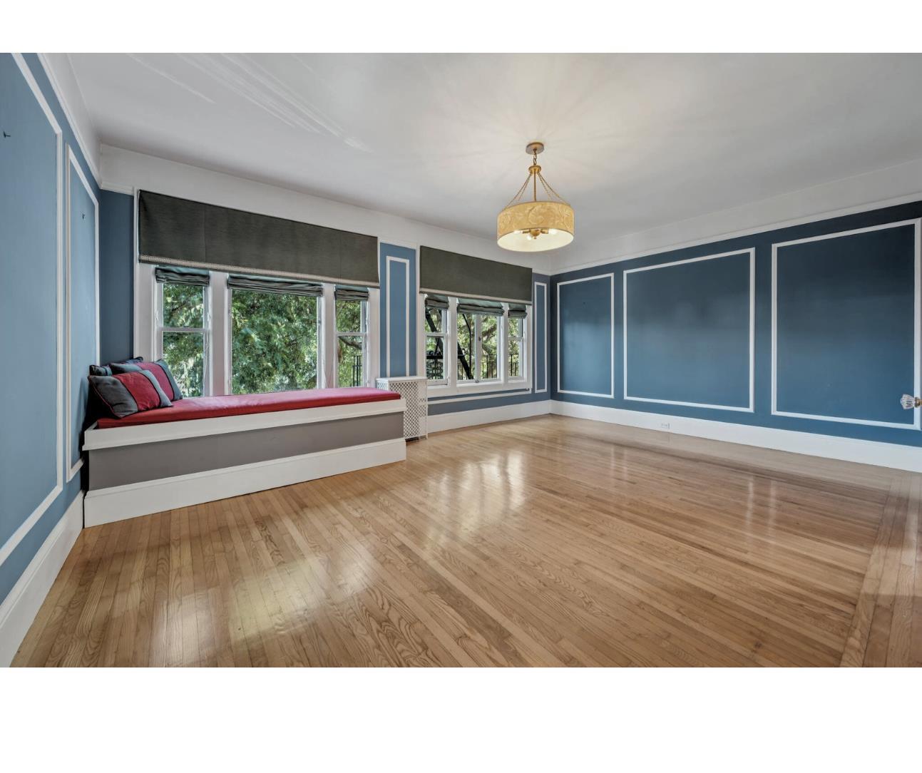 189 Commonwealth Avenue, Unit 3 San Francisco, CA 94118 - Photo 18 of 25 Abundant light with windows framing the tree-lined street