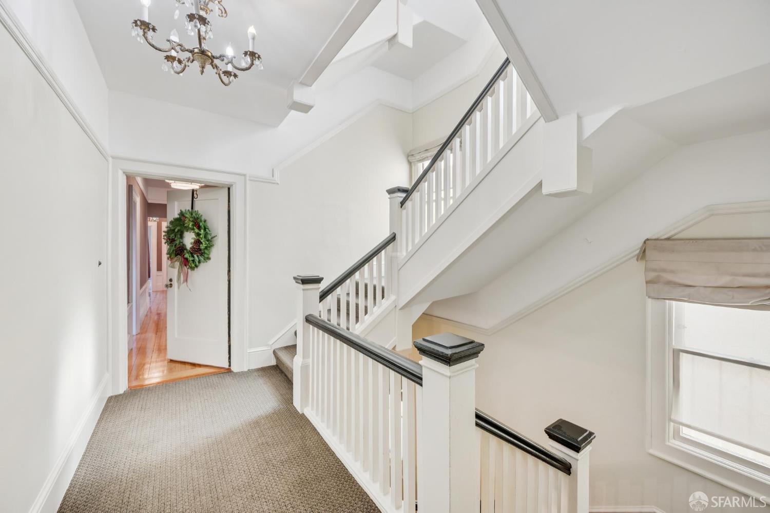 189 Commonwealth Avenue, Unit 3 San Francisco, CA 94118 - Photo 4 of 25 a view of staircase with railing and white walls