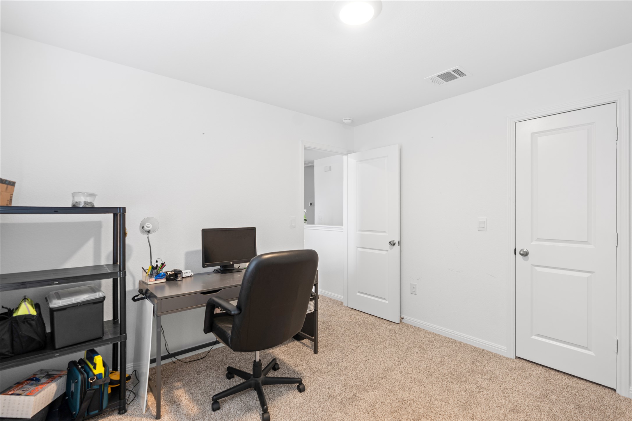 143 Santa Rosa Lane Buda, TX 78610 - Photo 22 of 28 Carpeted office space with baseboards