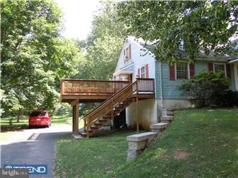 99 Warden Road Doylestown, PA 18901 - Photo 3 of 11 a view of a house with a park