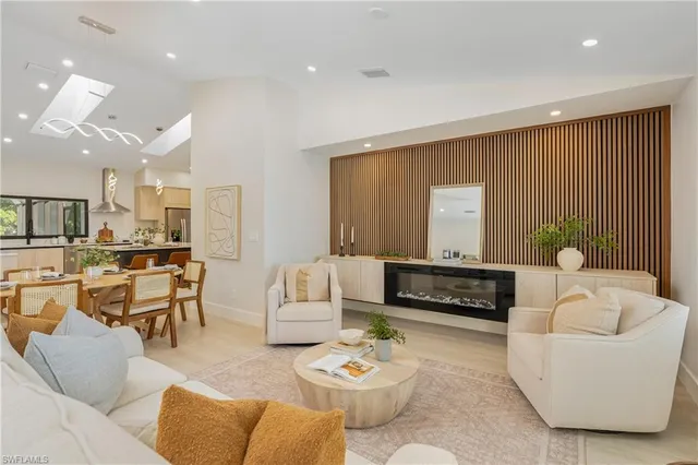 a living room with furniture and a couch