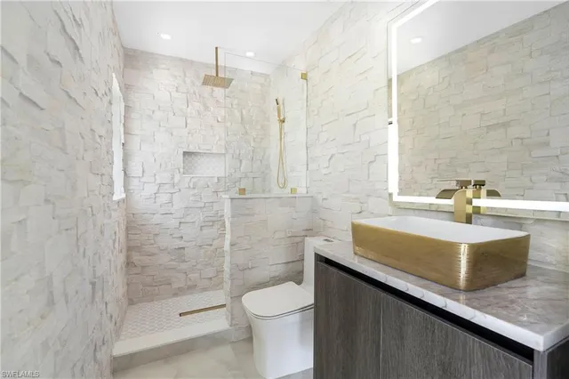 a view of a swimming pool with a yard