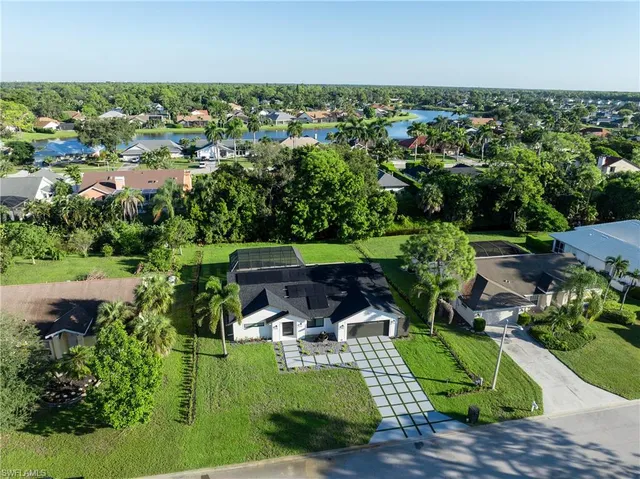 an aerial view of a house with a garden