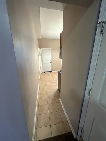 a view of an entryway with a window