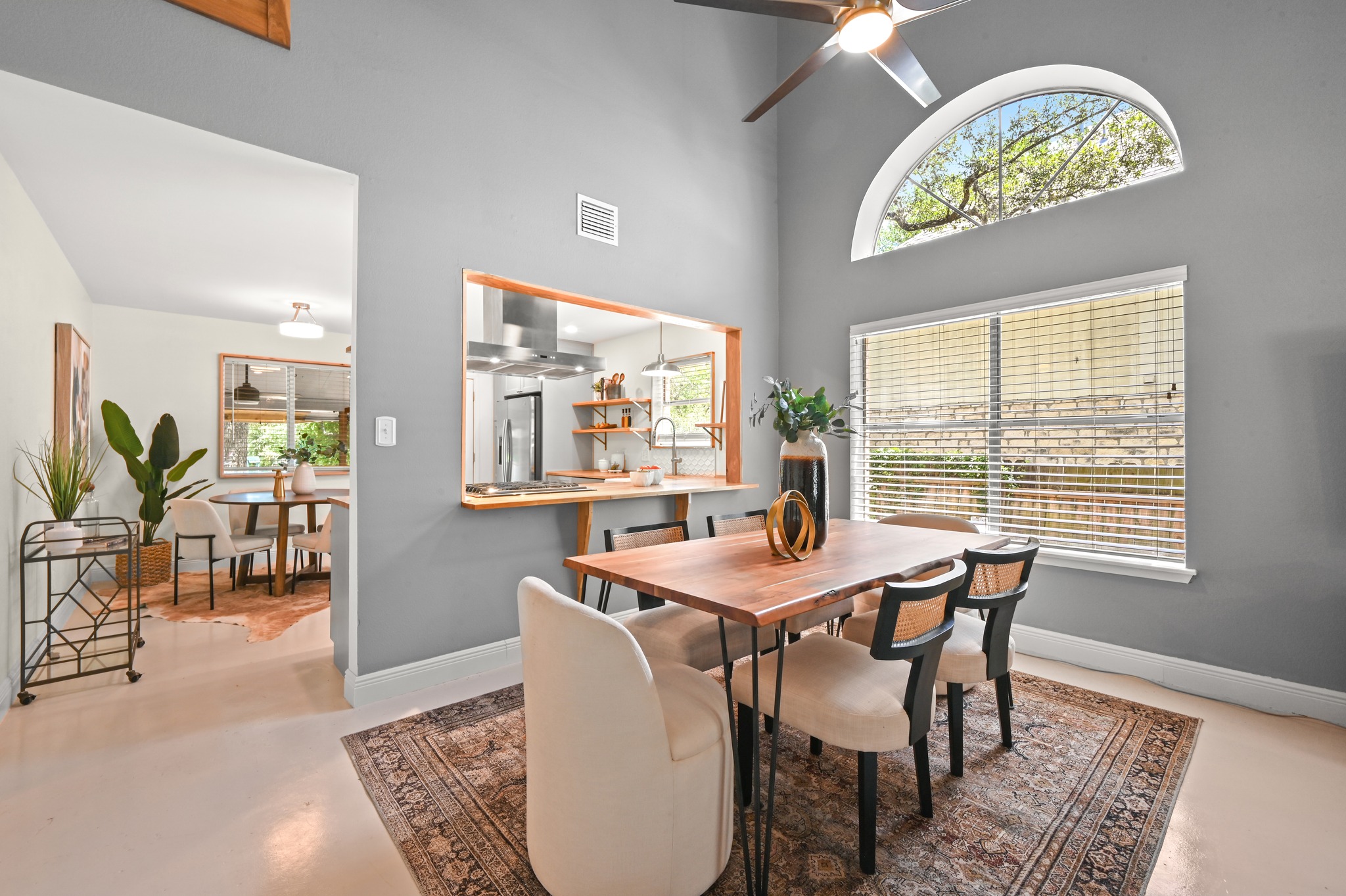 708 Shade Tree Drive Austin, TX 78748 - Photo 32 of 32 Spacious open floor plan formal dining alongside an arching picture windows.