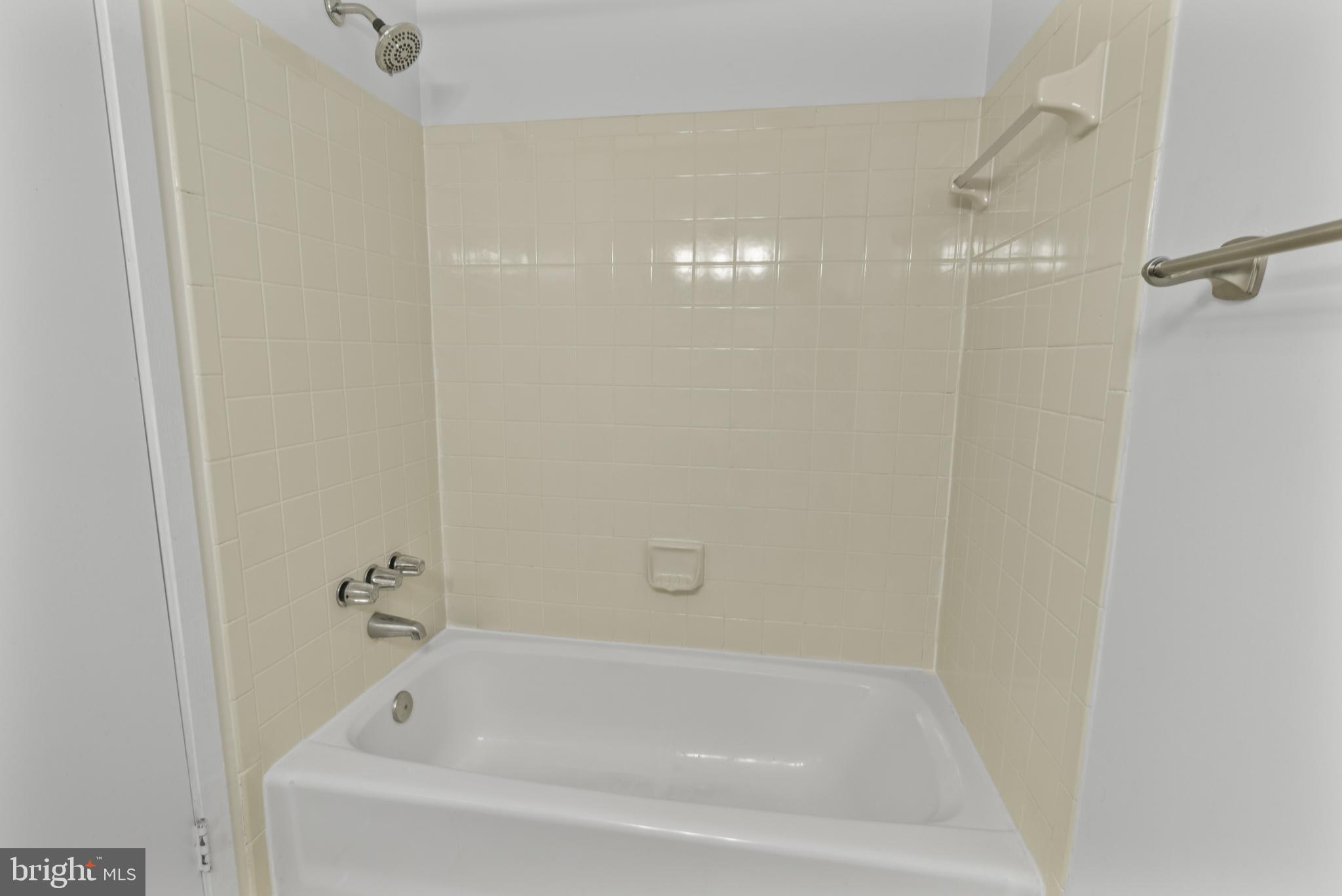 9802 Sailfish Terrace Gaithersburg, MD 20886 - Photo 10 of 18 a close view of a bathtub in bathroom