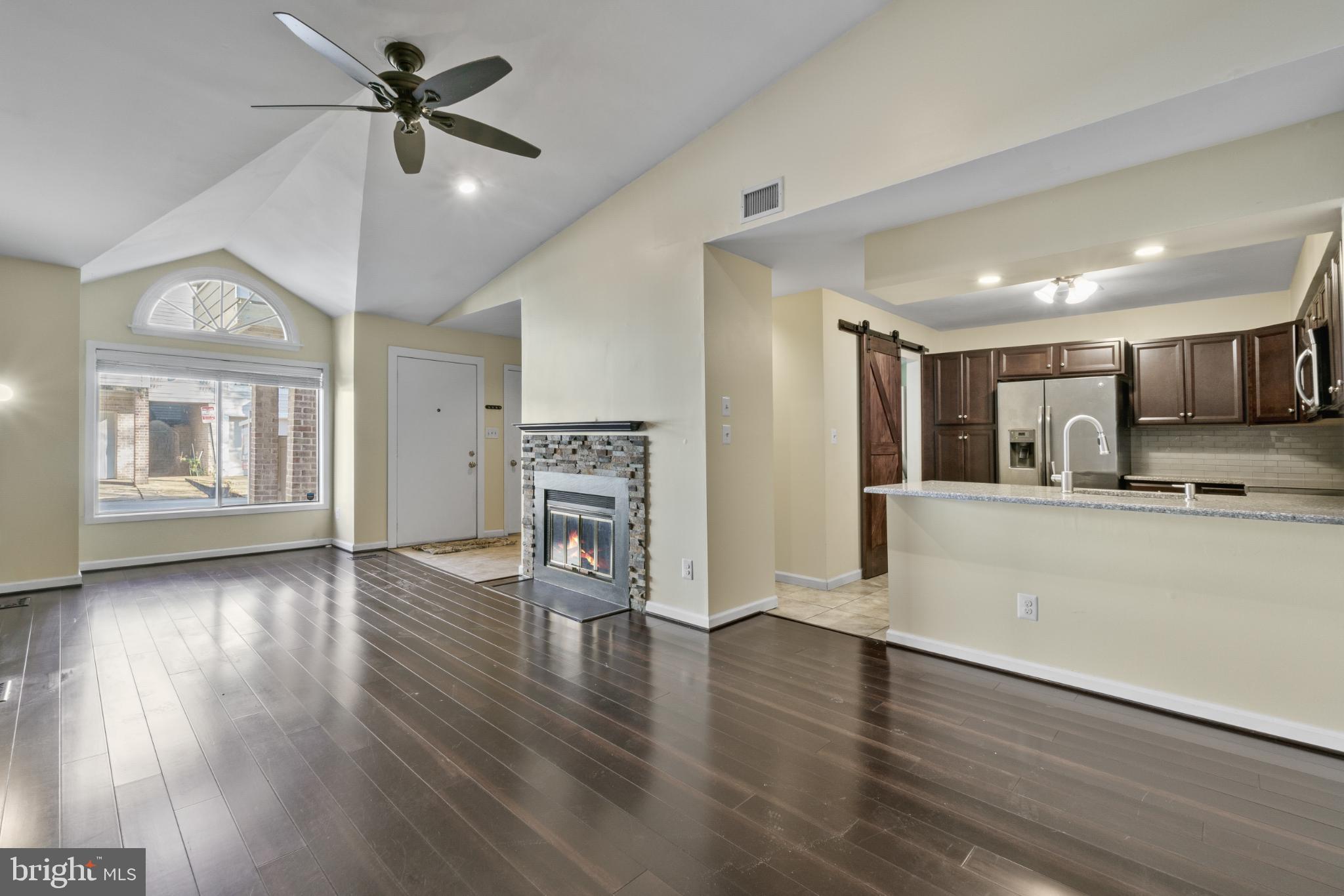 9802 Sailfish Terrace Gaithersburg, MD 20886 - Photo 2 of 18 a view of empty room with wooden floor and window