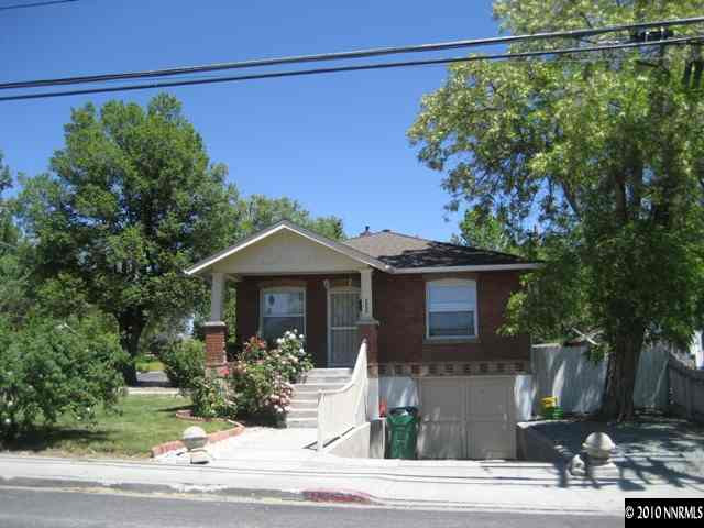 535 West 11th Street Reno, NV 89503 - Photo 1 of 4 a front view of a house with garden