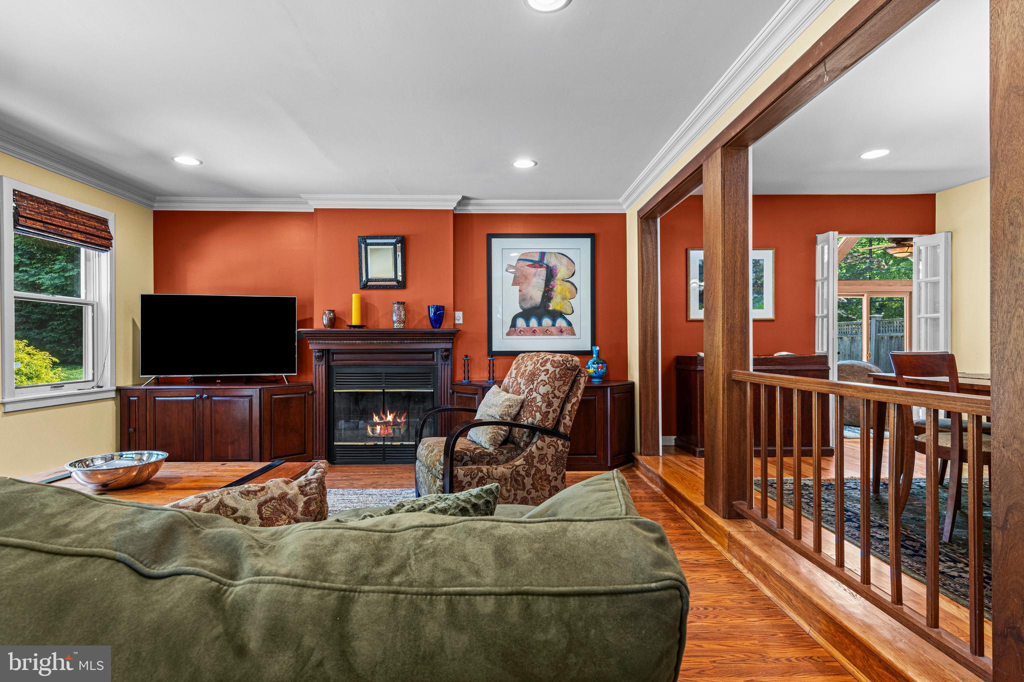 231 West Valley Road Wayne, PA 19087 - Photo 12 of 61 a living room with furniture a flat screen tv and a fireplace